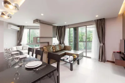 Suite familiar Deluxe de dos dormitorios con bañera de hidromasaje — The Regent Phuket Bangtao Beach